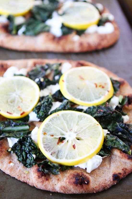 Meyer Lemon, Kale, and Goat Cheese Flatbread Recipe on twopeasandtheirpod.com Love this easy flatbread recipe! It full of flavor! Meyer Lemon, Kale, and Goat Cheese Flatbread Recipe on twopeasandtheirpod.com