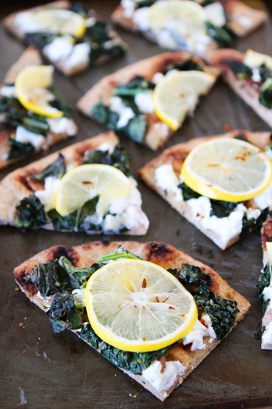 Meyer Lemon, Kale, and Goat Cheese Flatbread Recipe on twopeasandtheirpod.com Love this easy and healthy flatbread recipe! Perfect for lunch, dinner, or as an appetizer for parties! Meyer Lemon, Kale, and Goat Cheese Flatbread Recipe
