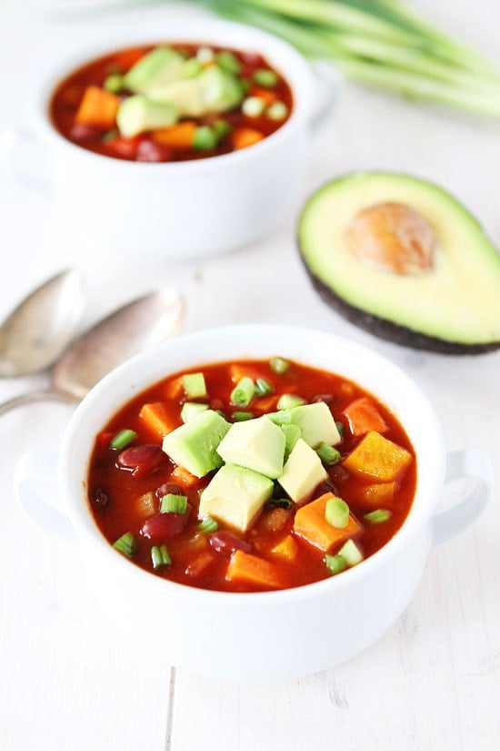 Slow Cooker Vegan Sweet Potato Chili Recipe on twopeasandtheirpod.com This healthy chili is a family favorite! Let your crockpot make you dinner! Slow Cooker Vegan Sweet Potato Chili Recipe