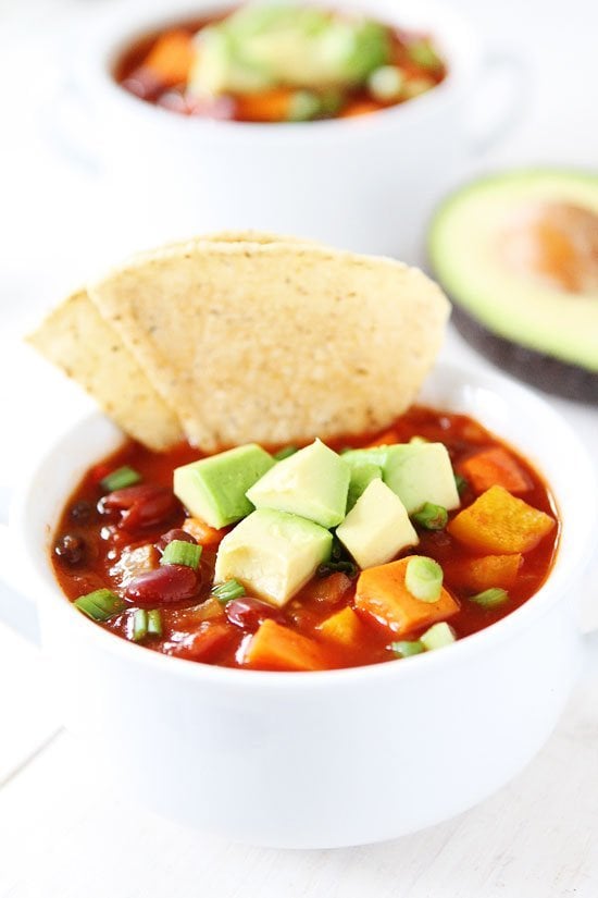 Slow Cooker Vegan Sweet Potato Chili Recipe on twopeasandtheirpod.com This healthy chili is a family favorite! It is vegan, gluten-free and made in the slow cooker! Slow Cooker Vegan Sweet Potato Chili Recipe