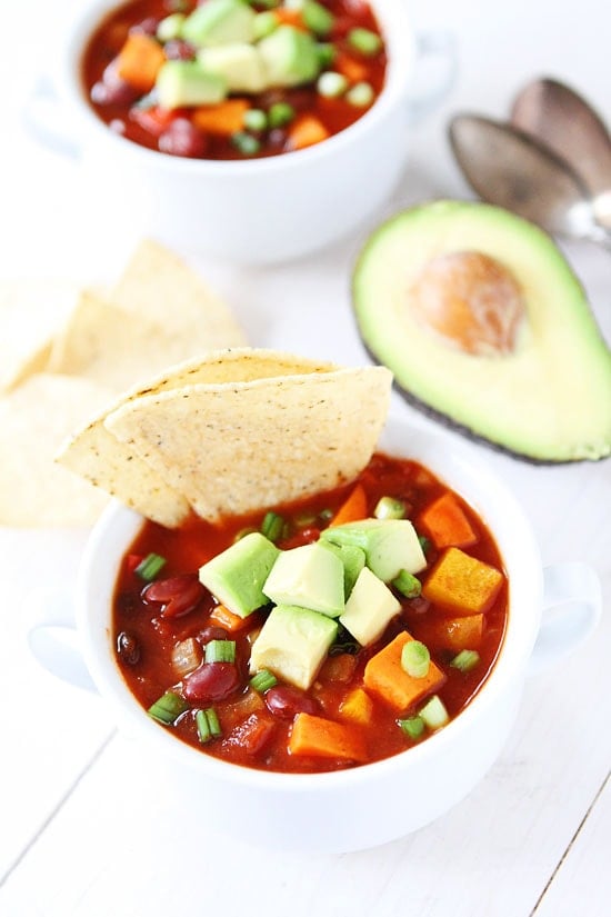 Slow Cooker Vegan Sweet Potato Chili Recipe on twopeasandtheirpod.com This healthy chili is a family favorite! Let your slow cooker make you dinner! Slow Cooker Vegan Sweet Potato Chili Recipe on twopeasandtheirpod.com