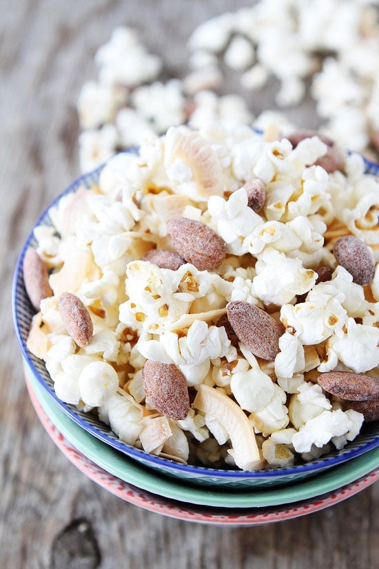 Toasted Coconut Kettle Corn Recipe on twopeasandtheirpod.com This easy kettle corn recipe is great for game day, movie night, or any day! Toasted Coconut Kettle Corn Recipe on twopeasandtheirpod.com