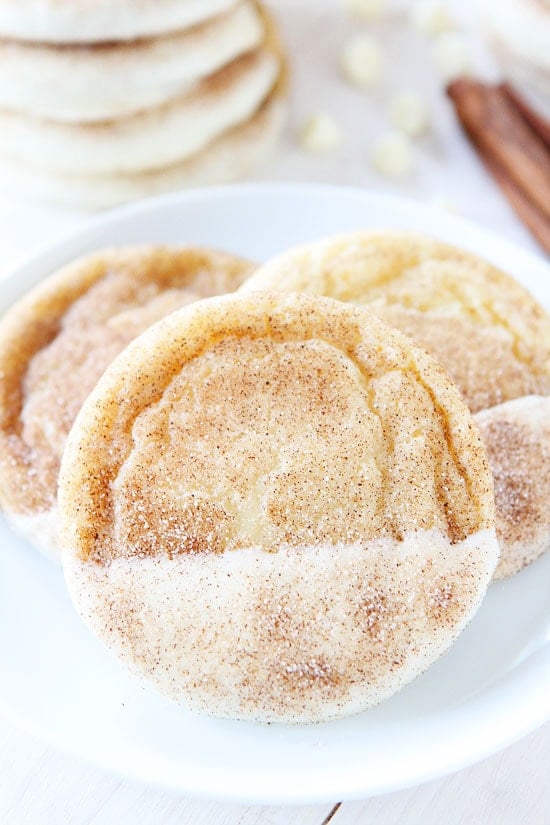 White Chocolate Dipped Snickerdoodles Recipe on twopeasandtheirpod.com Classic snickerdoodles dipped in white chocolate and sprinkled with cinnamon sugar. These cookies are SO pretty and SO good! White Chocolate Dipped Snickerdoodles Recipe on twopeasandtheirpod.com