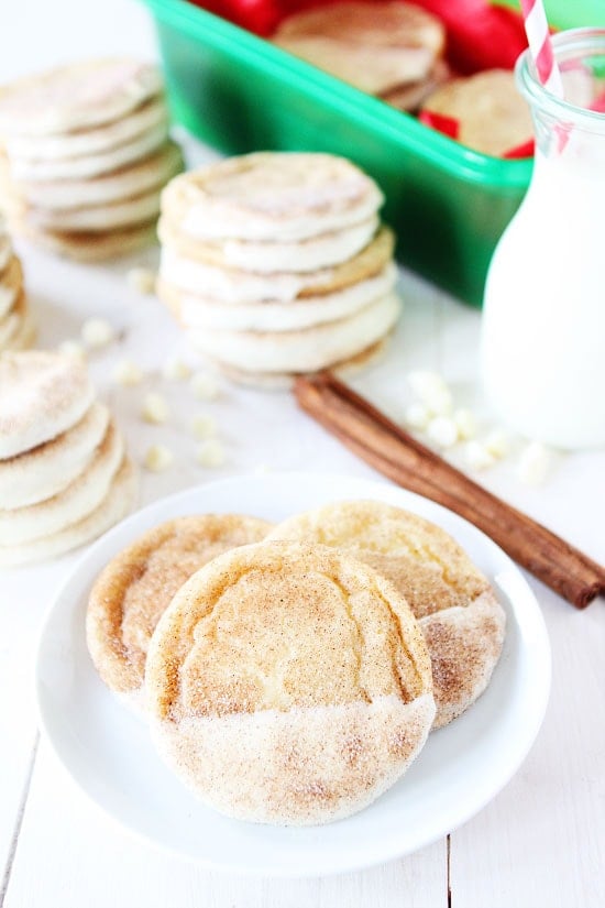 White Chocolate Dipped Snickerdoodles Recipe on twopeasandtheirpod.com Classic snickerdoodles dipped in white chocolate! The perfect cookie for the holidays! White Chocolate Dipped Snickerdoodles Recipe