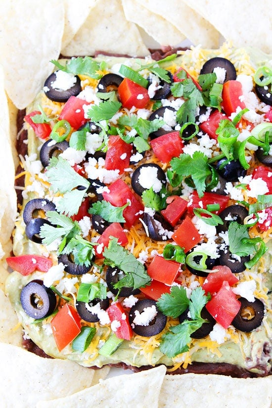 Mexican Layer Dip Recipe on twopeasandtheirpod.com This easy dip is always a favorite at parties! Seven Layer Dip Recipe