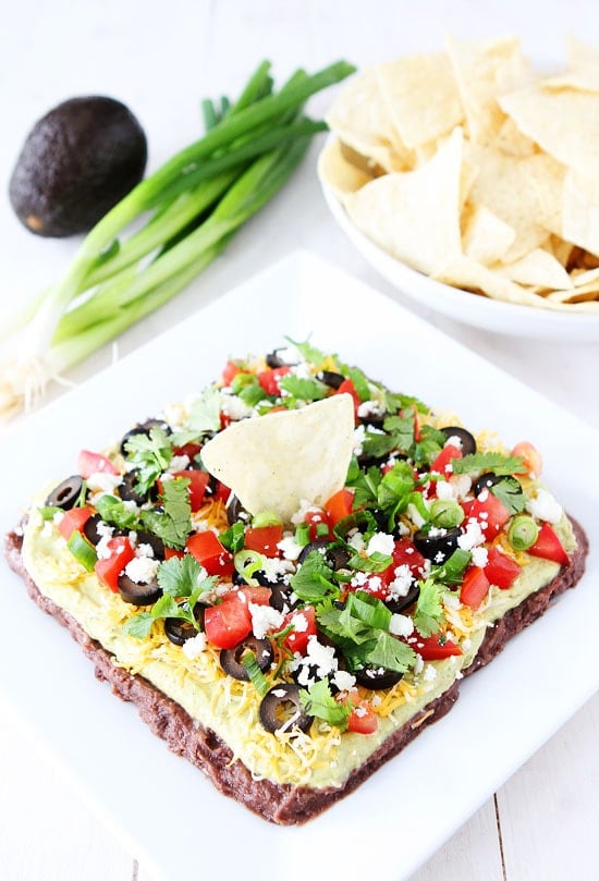 Mexican Layer Dip Recipe on twopeasandtheirpod.com This dip is always a hit at parties and it is easy to make too! Mexican Layer Dip
