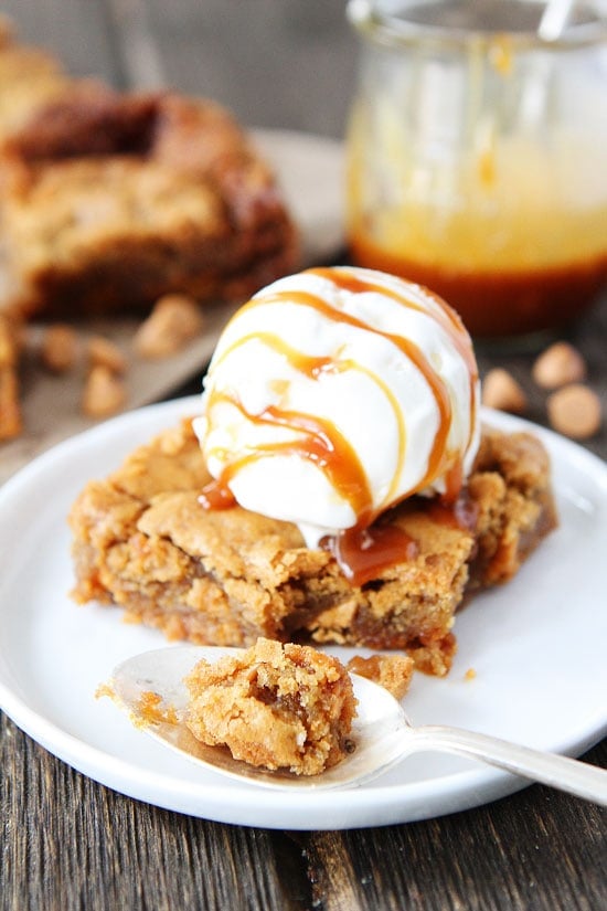 Salted Caramel Butterscotch Blondies Recipe on twopeasandtheirpod.com Chewy blondies with butterscotch chips and salted caramel. Add a scoop of vanilla ice cream and you have the perfect dessert! Salted Caramel Butterscotch Blondies