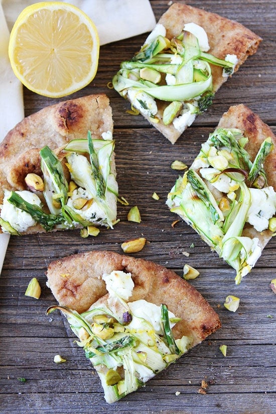 Asparagus, Goat Cheese, and Pistachio Flatbread Recipe on twopeasandtheirpod.com The perfect flatbread for spring! Asparagus, Goat Cheese, and Pistachio Flatbread Recipe