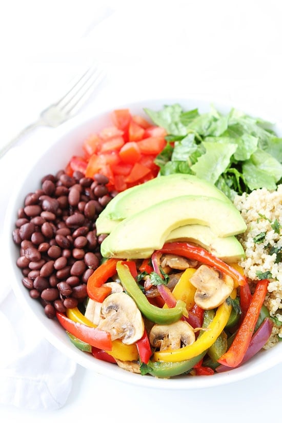 Fajita Quinoa Bowls Recipe on twopeasandtheirpod.com If you like fajitas, you will love these fajita bowls! They are gluten-free, vegan, and SO good! Fajita Quinoa Bowls Recipe
