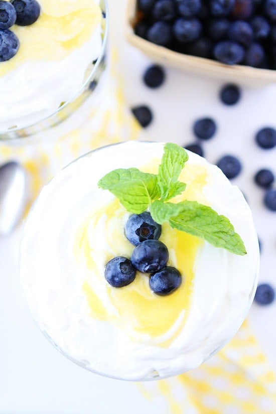Lemon Blueberry Trifle Recipe on twopeasandtheirpod.com Lemon cake, lemon curd, whipped cream, and blueberries are layered to create a divine dessert! Lemon Blueberry Trifle Recipe