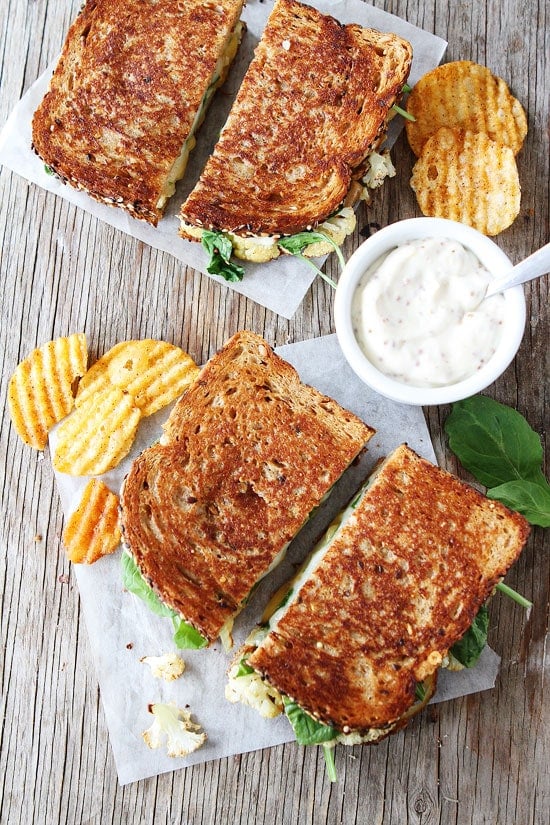 Roasted Cauliflower Grilled Cheese with Lemon Mustard Aioli Recipe on twopeasandtheirpod.com This is the ultimate grilled cheese! Roasted Cauliflower Grilled Cheese Recipe with Lemon Mustard Aioli