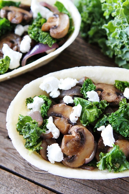 Roasted Mushroom, Kale, and Goat Cheese Tacos Recipe on twopeasandtheirpod.com Love these easy vegetarian tacos! Roasted Mushroom, Kale, and Goat Cheese Tacos Recipe