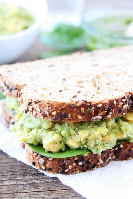 Smashed Chickpea, Avocado, and Pesto Salad Recipe on twopeasandtheirpod.com This chickpea salad is great as a dip or sandwich! Smashed Chickpea, Avocado, and Pesto Salad