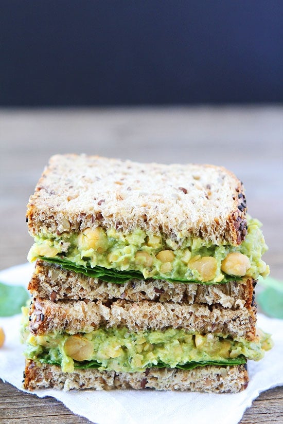 Smashed Chickpea, Avocado, and Pesto Salad Sandwich Recipe on twopeasandtheirpod.com I love making this sandwich for lunch. It only takes minutes to make and is SO good! Smashed Chickpea, Avocado, and Pesto Salad Sandwich Recipe