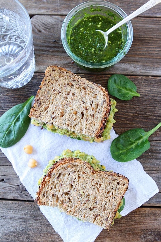 Smashed Chickpea, Avocado, and Pesto Salad Sandwich Recipe on twopeasandtheirpod.com I love this easy and healthy sandwich! It is my favorite! Smashed Chickpea, Avocado, and Pesto Salad Sandwich