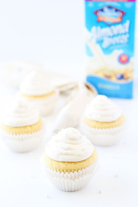 Vanilla Almond Cupcake Recipe on twopeasandtheirpod.com Tender and moist vanilla almond cupcakes with creamy vanilla almond buttercream frosting. Vanilla Almond Cupcakes