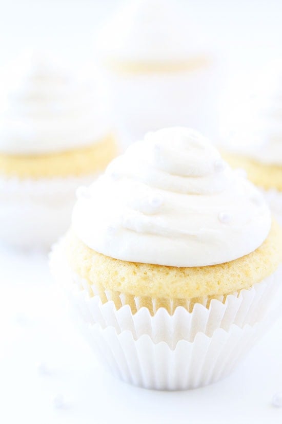 Vanilla Almond Cupcake Recipe on twopeasandtheirpod.com The BEST vanilla cupcake recipe! These pretty cupcakes are perfect for parties, weddings, or showers! Vanilla Almond Cupcake Recipe