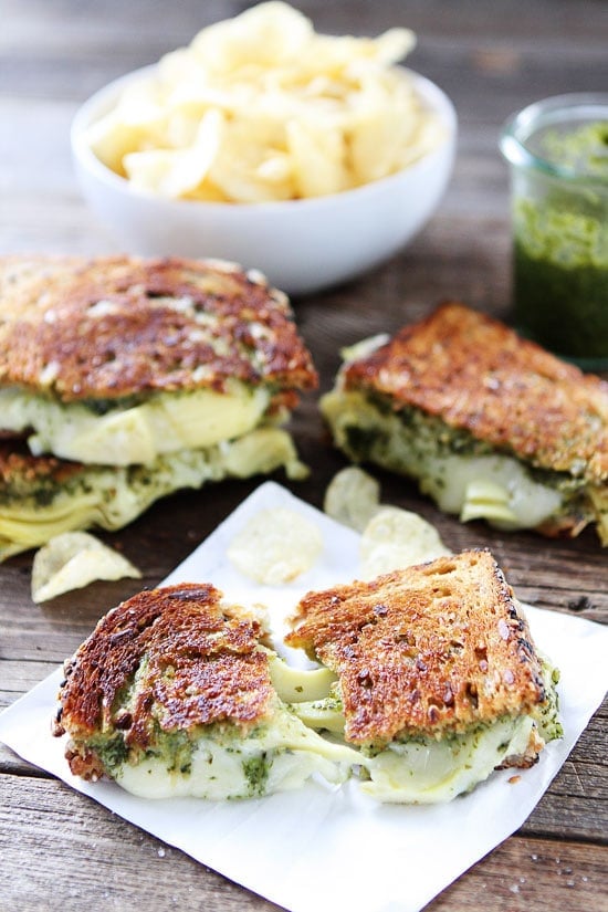 Pesto, Artichoke, and Havarti Grilled Cheese Recipe on twopeasandtheirpod.com One of my all-time favorite grilled cheese recipes! You have to try this one! Pesto, Artichoke, and Havarti Grilled Cheese Recipe
