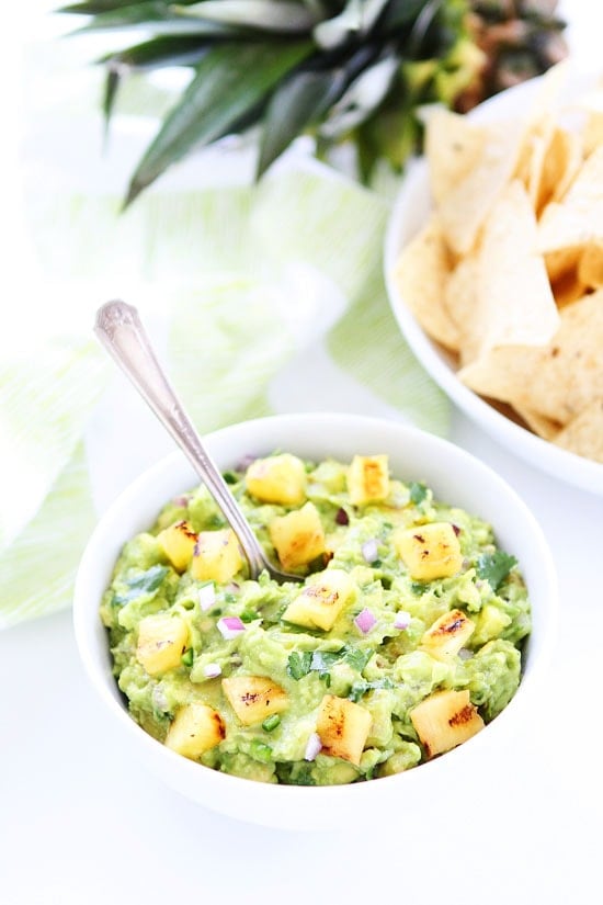 Grilled Pineapple Guacamole Recipe on twopeasandtheirpod.com The grilled pineapple makes this guacamole extra special! It is the perfect guacamole for summertime! Grilled Pineapple Guacamole Recipe