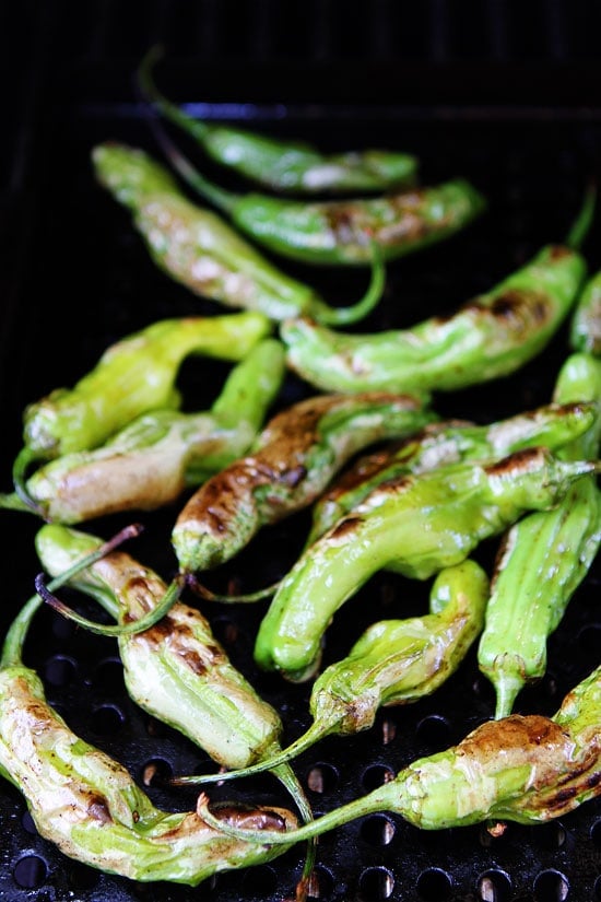 Grilled Shishito Peppers Recipe on twopeasandtheirpod.com This recipe is so simple! A great appetizer or side dish for summer! Grilled Shishito Peppers Recipe