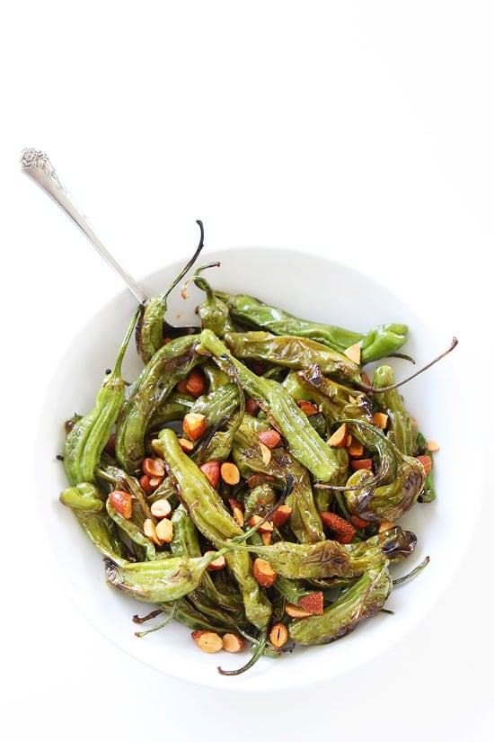 Grilled Shishito Peppers Recipe on twopeasandtheirpod.com You will love these mild and sweet grilled peppers! They are great served as an appetizer or side dish! Grilled Shishito Peppers Recipe
