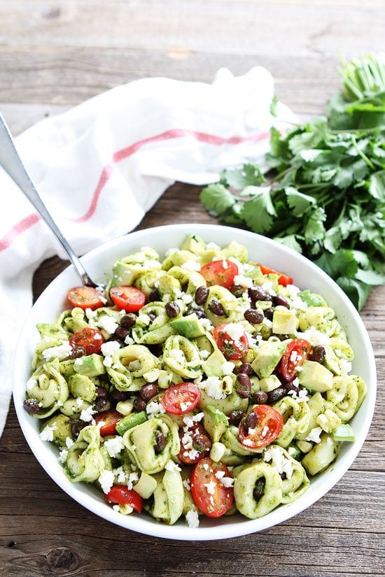 Mexican Tortellini Salad Recipe on twopeasandtheirpod.com This easy pasta salad is perfect for potlucks, BBQ's, picnics, or any day! Mexican Tortellini Salad Recipe