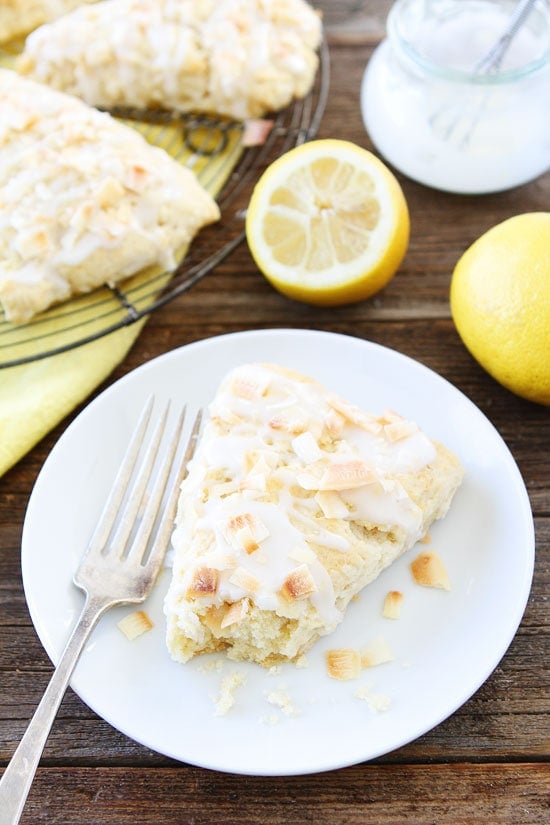 Toasted Coconut Lemon Scones Recipe on twopeasandtheirpod.com My favorite scone recipe! They are perfect for breakfast, brunch, or tea time! Toasted Coconut Lemon Scones Recipe