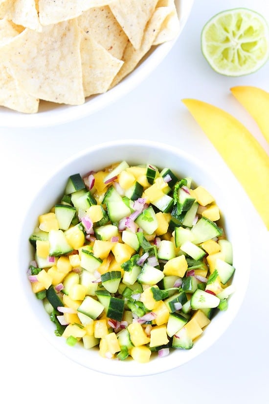 Cucumber Mango Salsa Recipe on twopeasandtheirpod.com This fresh and simple salsa is great with chips, grilled chicken, or fish! The perfect salsa for summertime! Cucumber Mango Salsa Recipe