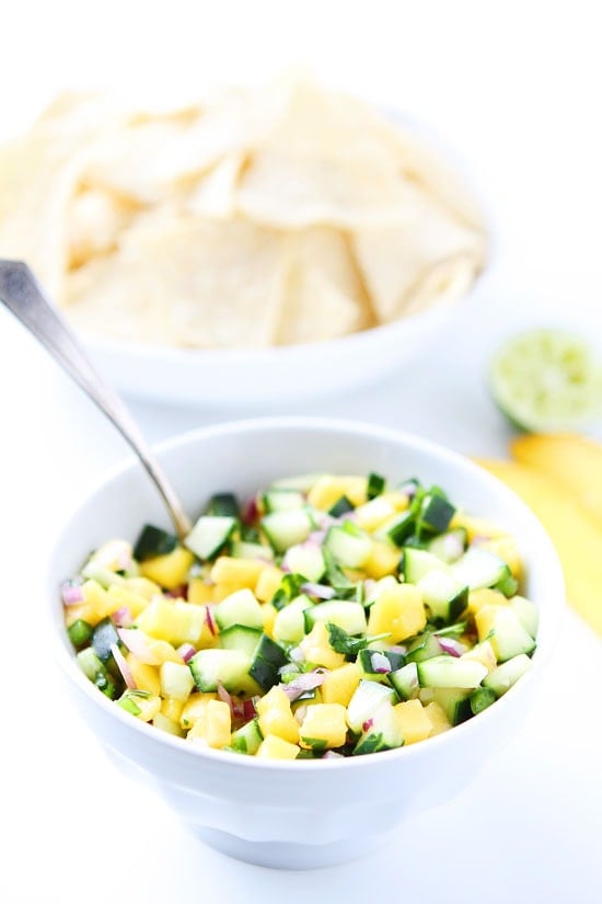 Cucumber Mango Salsa Recipe on twopeasandtheirpod.com This fresh and simple salsa is great with chips, grilled chicken, or fish! The perfect salsa for summer! Cucumber Mango Salsa Recipe