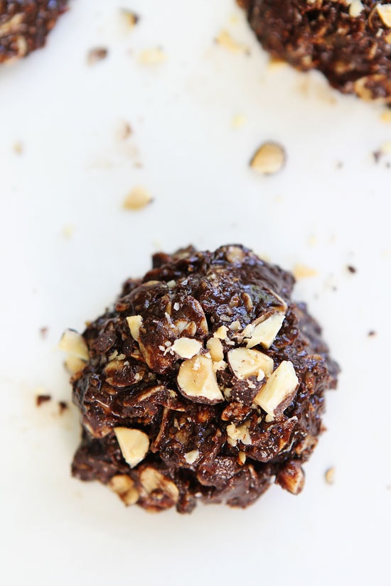 No-Bake Dark Chocolate Almond Cookie Recipe on twopeasandtheirpod.com These easy and healthy no-bake cookies are SO good and they only take 15 minutes to make! No-Bake Dark Chocolate Almond Cookie Recipe