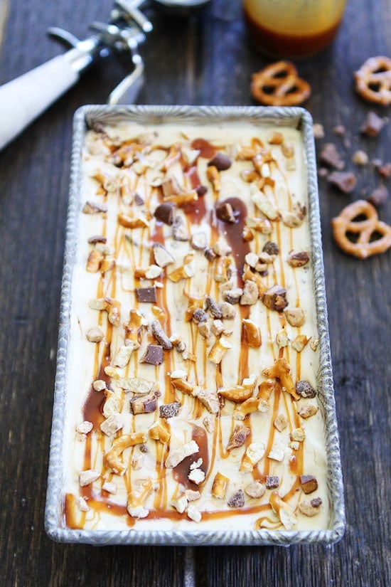 No Churn Salted Caramel Toffee Pretzel Ice Cream Recipe on twopeasandtheirpod.com This is the BEST ice cream and it's easy to make too! No Churn Salted Caramel Toffee Pretzel Ice Cream