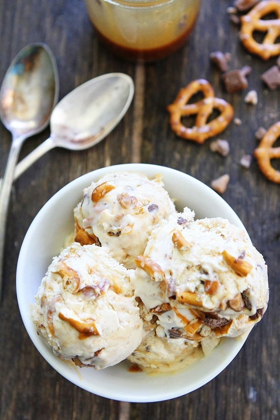 No Churn Salted Caramel Toffee Pretzel Ice Cream Recipe on twopeasandtheirpod.com Vanilla ice cream with salted caramel, toffee, and pretzels. This easy no churn ice cream is the BEST! No Churn Salted Caramel Toffee Pretzel Ice Cream Recipe