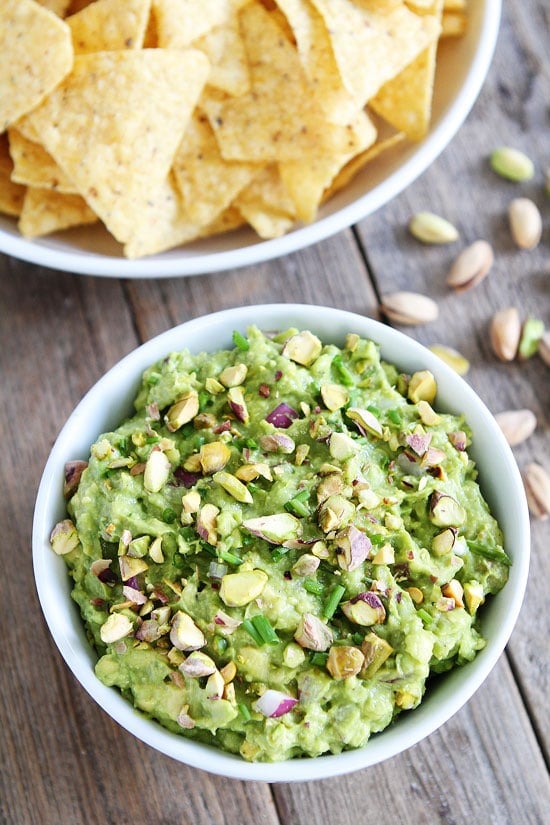 Pistachio Guacamole Recipe on twopeasandtheirpod.com This guacamole is great as an appetizer, snack, and goes great with any meal! Pistachio Guacamole Recipe