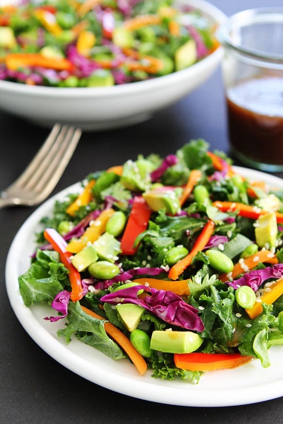 Asian Kale Salad Recipe on twopeasandtheirpod.com This healthy and colorful salad is easy to make and a favorite at our house! Try it today! Asian Kale Salad Recipe