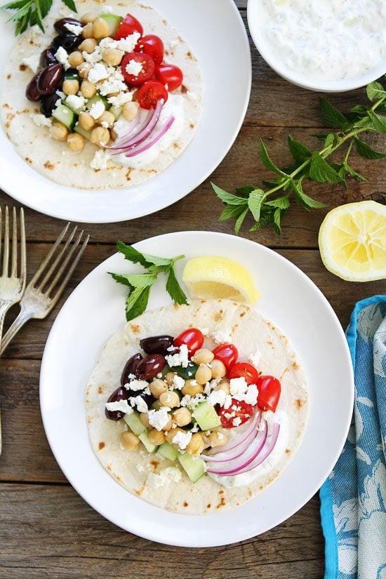 Greek Taco Recipe on twopeasandtheirpod.com Mix up taco night and make these simple, fresh, and healthy vegetarian tacos! Greek Tacos Recipe