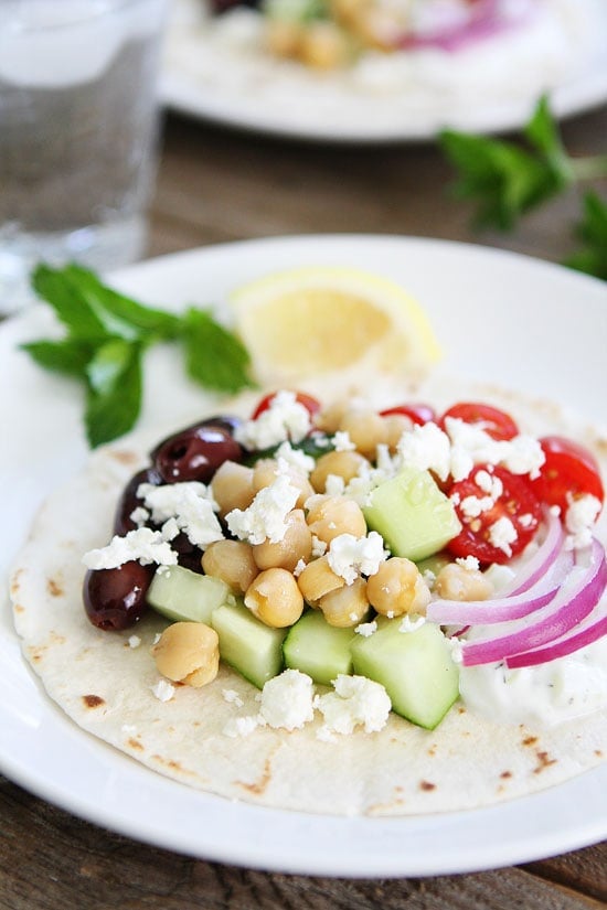 Greek Tacos Recipe on twopeasandtheirpod.com Mix up taco night and make these fresh and simple tacos! They are always a hit at the dinner table. Greek Tacos Recipe