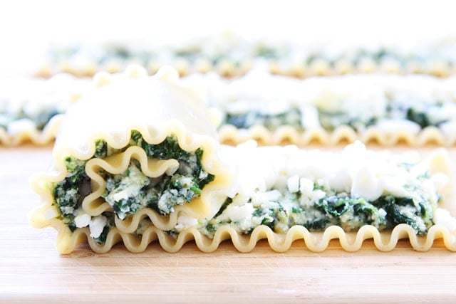 Pesto Lasagna Roll Ups Recipe on twopeasandtheirpod.com One of our favorite meals! Pesto Lasagna Roll Ups Recipe