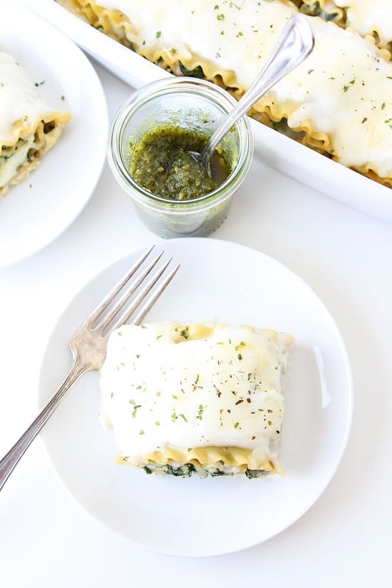 Pesto Lasagna Roll Ups Recipe on twopeasandtheirpod.com Cheesy pesto lasagna all rolled up into individual servings! This lasagna is fun to make and eat! Pesto Lasagna Roll Ups Recipe