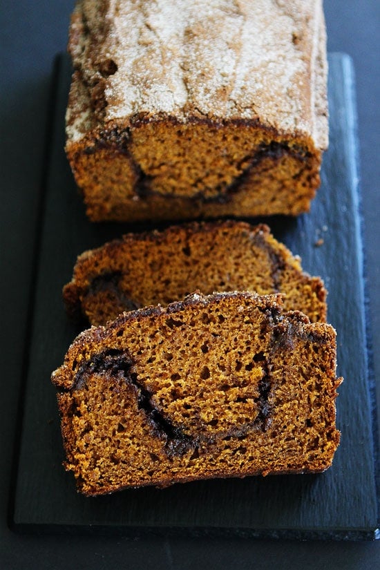 Pumpkin Cinnamon Swirl Bread Recipe on twopeasandtheirpod.com Pumpkin bread with a sweet cinnamon sugar swirl through the center. This is the BEST pumpkin bread recipe! Pumpkin Cinnamon Swirl Bread Recipe