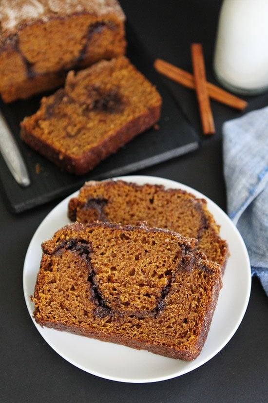 Pumpkin Cinnamon Swirl Bread Recipe on twopeasandtheirpod.com Pumpkin bread with a sweet cinnamon sugar swirl through the center. This easy pumpkin bread is a must make for fall! Pumpkin Cinnamon Swirl Bread Recipe
