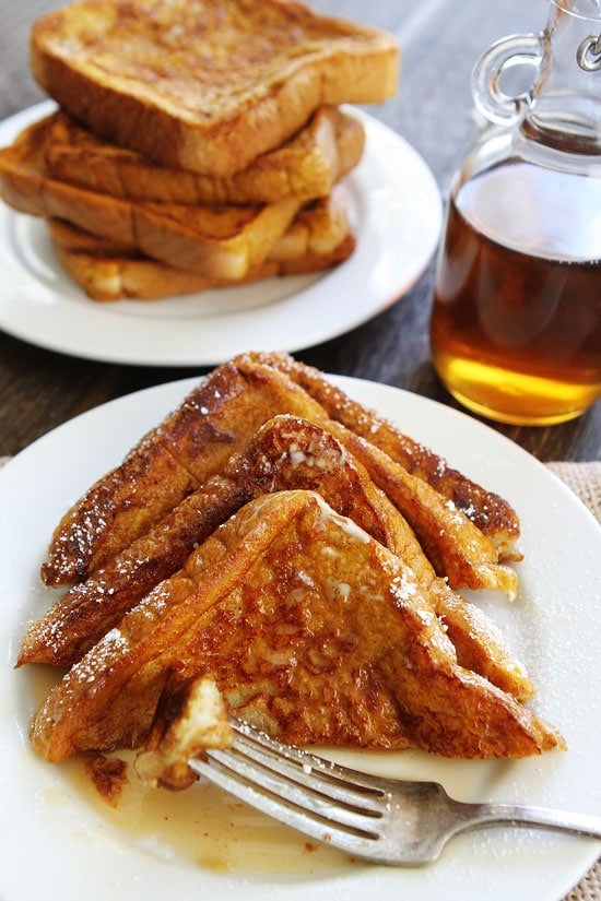 Pumpkin French Toast Recipe on twopeasandtheirpod.com The BEST French toast and it's easy to make too! Pumpkin French Toast Recipe