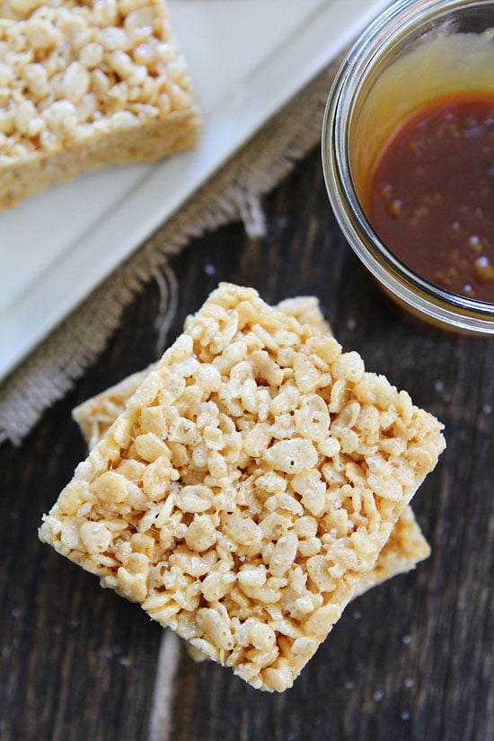 Salted Caramel Rice Krispies Treats Recipe on twopeasandtheirpod.com Classic Rice Krispies Treats made even better by adding salted caramel sauce! We LOVE these easy treats! Salted Caramel Rice Krispies Treats Recipe