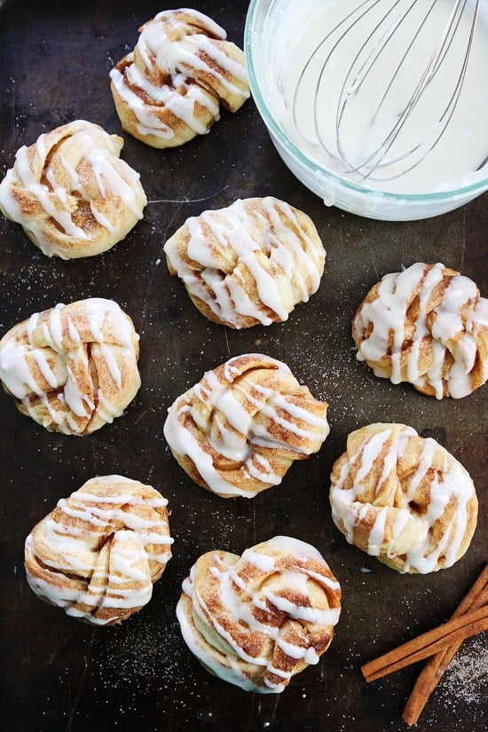 Easy Cinnamon Roll Knots Recipe on twopeasandtheirpod.com These quick and easy cinnamon roll knots are made with pizza dough and taste just like cinnamon rolls. Easy Cinnamon Roll Knots Recipe
