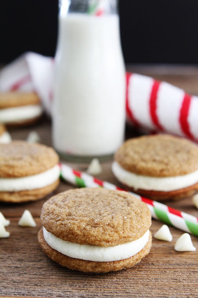 Gingersnap Sandwich Cookies with White Chocolate Filling Recipe on twopeasandtheirpod.com Soft gingersnap cookies filled with white chocolate buttercream frosting! These cookies are SO good! Gingersnap Sandwich Cookies with White Chocolate Filling Recipe