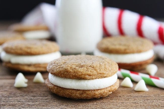 Gingersnap Sandwich Cookies with White Chocolate Filling Recipe on twopeasandtheirpod.com The BEST Christmas cookies! Gingersnap Sandwich Cookies with White Chocolate Filling Recipe