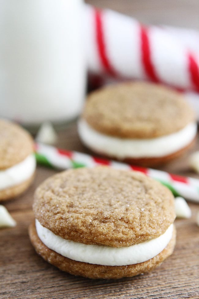Gingersnap Sandwich Cookies with White Chocolate Filling Recipe on twopeasandtheirpod.com Soft gingersnap cookies filled with white chocolate buttercream frosting! The perfect cookies for the holiday season! Gingersnap Sandwich Cookies with White Chocolate Filling Recipe