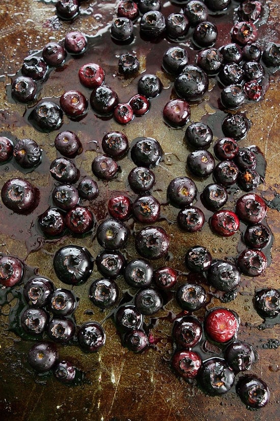 Maple Roasted Blueberry Almond Oatmeal Recipe on twopeasandtheirpod.com Hearty oatmeal topped with maple roasted blueberries, almonds, and chia seeds. The perfect breakfast! Maple Roasted Blueberry Almond Oatmeal Recipe