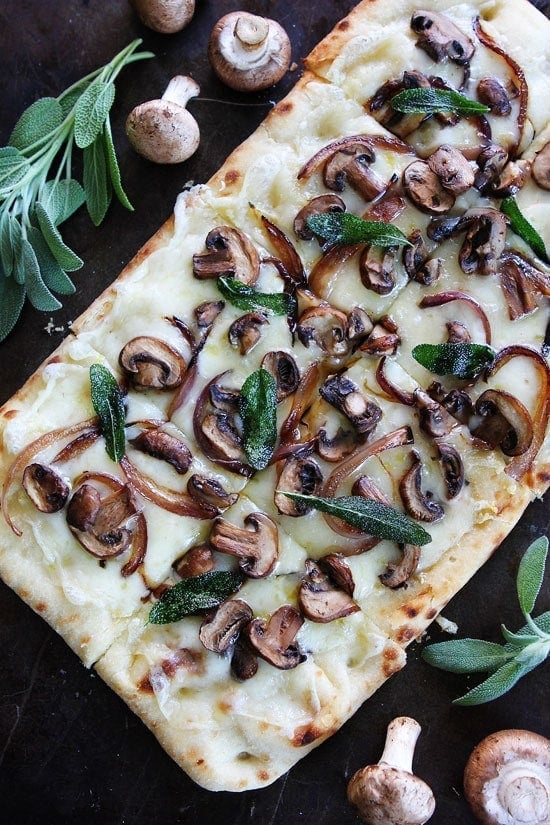 Mushroom Fontina Flatbread with Crispy Sage Recipe on twopeasandtheirpod.com This quick and easy flatbread is great served as an appetizer or meal! Mushroom Fontina Flatbread with Crispy Sage