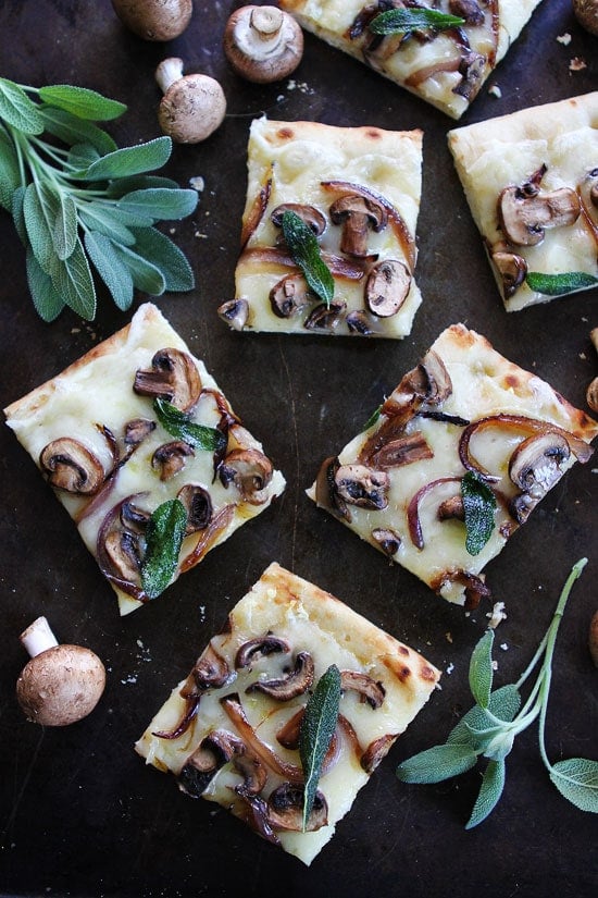 Mushroom Fontina Flatbread with Crispy Sage Recipe on twopeasandtheirpod.com This easy and cheesy flatbread can be made in 30 minutes. It is great as an appetizer or meal! Mushroom Fontina Flatbread with Crispy Sage Recipe