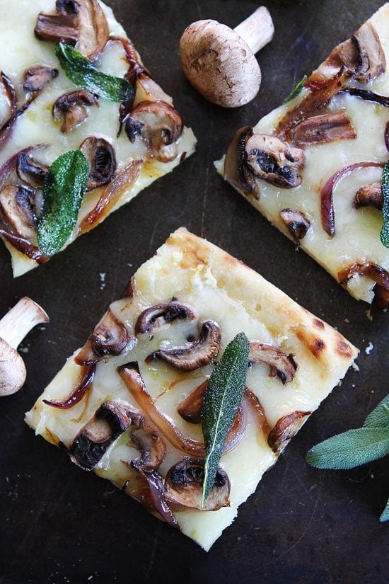 Mushroom Fontina Flatbread with Crispy Sage Recipe on twopeasandtheirpod.com This easy and cheesy flatbread can be made in 30 minutes. Mushroom Fontina Flatbread with Crispy Sage Recipe